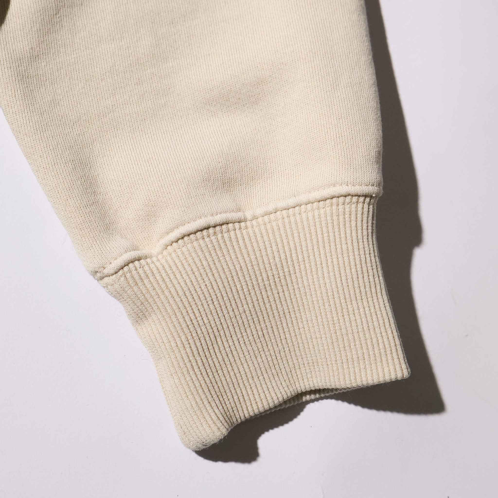PEANUTS / PIGMENT CREW NECK SWEAT NATURAL