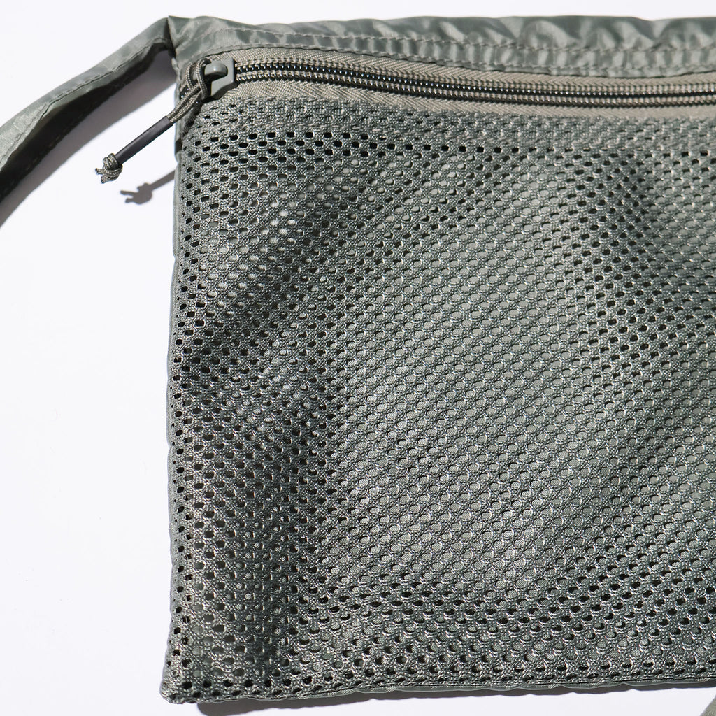 YMCLKY / FLEECE SCARF WITH POUCH